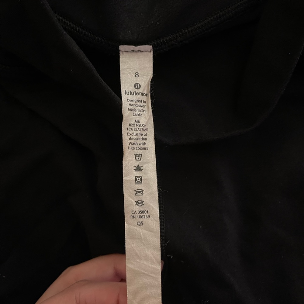 Black Lululemon leggings - black with floral lacing pattern